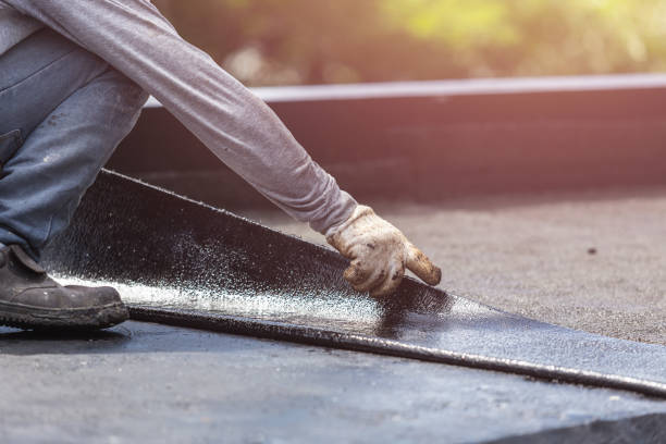 Professional Basement Waterproofing technician working in Markham, VA